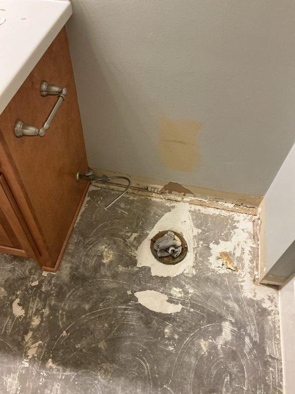 Completed preliminary installation work in bathroom undergoing renovation, including assessment of plumbing connections for customer-supplied fixtures (two toilets, three faucets, and two shower trim kits). Evaluated kitchen area for refrigerator water line hookup with all necessary connection points identified and prepared for final fixture installation.