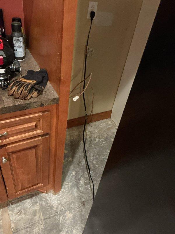 Completed preliminary installation work in bathroom undergoing renovation, including assessment of plumbing connections for customer-supplied fixtures (two toilets, three faucets, and two shower trim kits). Evaluated kitchen area for refrigerator water line hookup with all necessary connection points identified and prepared for final fixture installation.