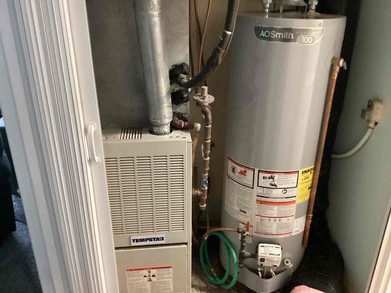 Investigated musty odor reported by customer, inspecting plumbing under pantry and utility room. Examination revealed minor leakage around sink P-trap with evidence of water damage and mold growth on cabinet floor. Identified improper washing machine drainage as contributing factor. Remediated leak at P-trap connection points and corrected washing machine drainage issue to prevent future moisture problems.