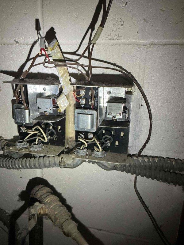 Diagnosed issue with 20+ year old Slant Fin boiler experiencing continuous operation. Located short in thermostat wire between aquastat relay and main floor thermostat, confirmed through continuity testing. Temporary solution implemented allowing customer to control system via breaker until return visit scheduled for replacement of 2-wire thermostat cable.