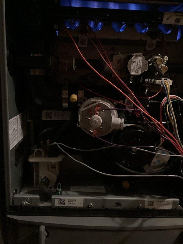 Responded to no heat call for 3-year-old LP furnace. Diagnosed low pressure switch stuck in closed position. Replaced faulty pressure switch, verified complete system operation was restored, and confirmed all other components were functioning properly.