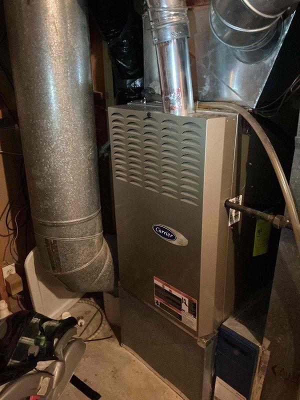 Conducted comprehensive inspection of 17-year-old Carrier furnace to assess safety and reliability. Major components (igniter, flame sensor, blower wheel/motor, draft motor) tested functional, however multiple holes were identified in the heat exchanger rendering the unit unsafe to operate. Combustion analysis results were acceptable, but heat exchanger deterioration appears age-related. Discussed replacement options with homeowner, including heat exchanger replacement versus full system replacement. Documentation provided for customer decision-making.