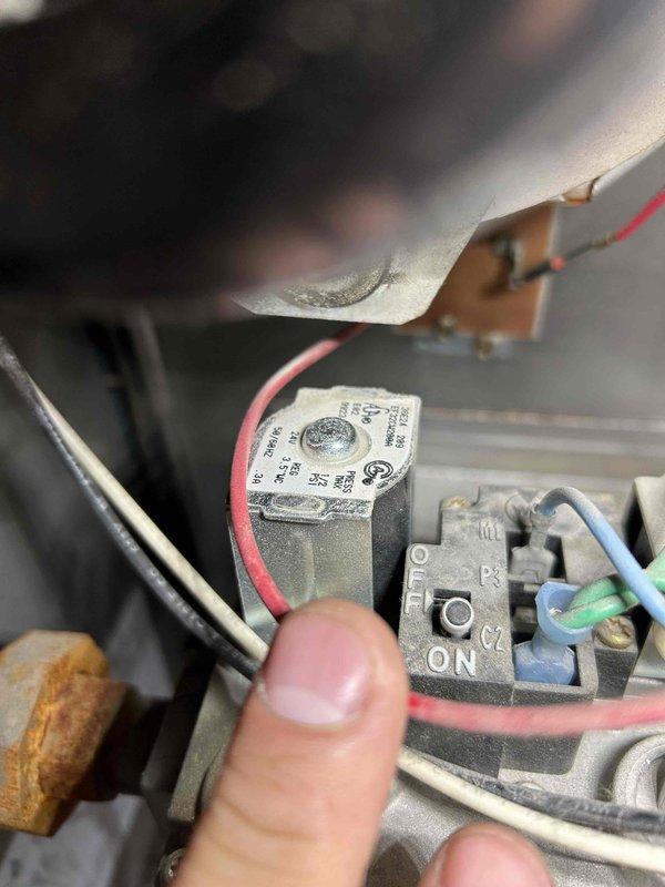 Responded to no heat complaint for 25+ year old furnace that was cycling without ignition. Bypassed furnace control board temporarily to restore heating function. Upon removing bypass clippers, unit continued to operate normally. Performed comprehensive diagnostics including gas pressure verification, carbon monoxide testing, and heat exchanger inspection with no hazardous conditions found. Cleaned flame sensor and checked pressure switch and flame rollout switches. Discovered extremely dirty furnace filter clogged with pet fur and dirt causing airflow restriction. Educated homeowner on proper filter maintenance, condensation trap cleaning, and keeping furnace area clear of obstructions. Unit now functioning properly.