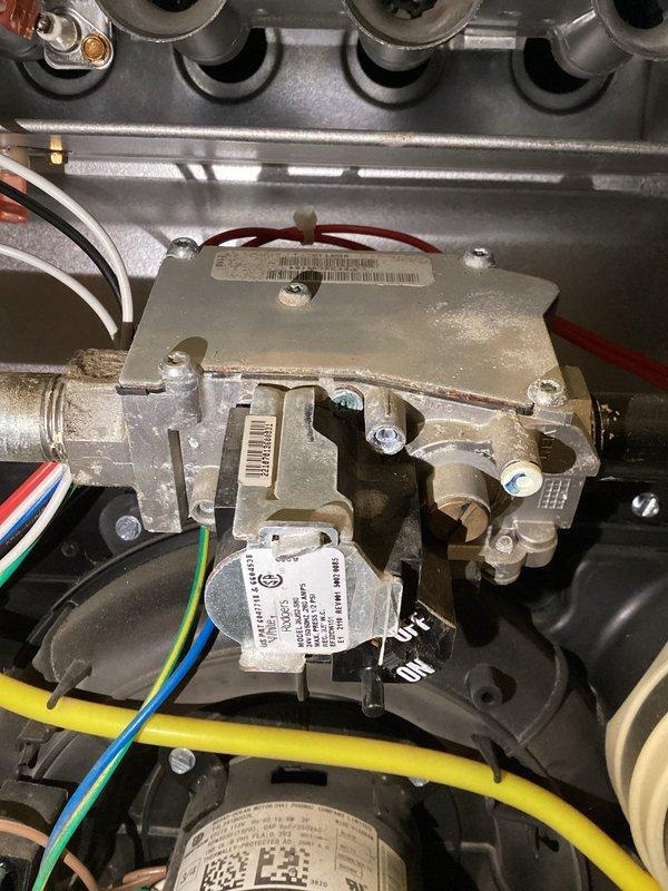 Shakopee, MN - Diagnosed no heat condition on 4-year-old furnace system. Visual inspection and testing confirmed faulty gas valve. Successfully replaced defective valve assembly and verified proper heating operation after repair. System now functioning normally.