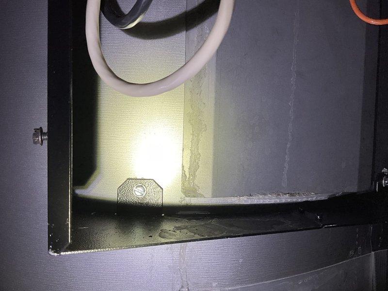 Responded to service call for leaking 80-gallon electric water heater (2023 Home Depot model). Determined unit was not repairable. Installed ball valve on cold water supply line to enable isolation of the water heater. Documented electrical panel configuration and existing plumbing setup with photographs. Recommended replacement with appropriate commercial model electric water heater.