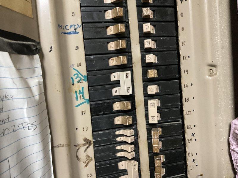 Responded to service call for leaking 80-gallon electric water heater (2023 Home Depot model). Determined unit was not repairable. Installed ball valve on cold water supply line to enable isolation of the water heater. Documented electrical panel configuration and existing plumbing setup with photographs. Recommended replacement with appropriate commercial model electric water heater.