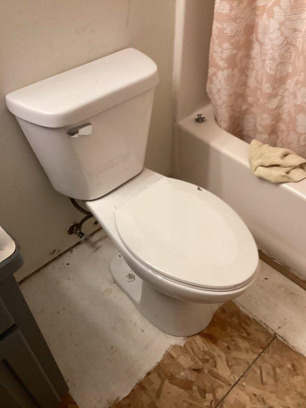 Woodville, WI - Temporarily reinstalled customer's toilet with new wax seal and proper shimming following previous flooding incident and remediation work. Confirmed proper function of recently purchased toilet components. Customer advised this is an interim installation, with future service required for toilet removal during flooring replacement and final reinstallation once flooring work is complete.