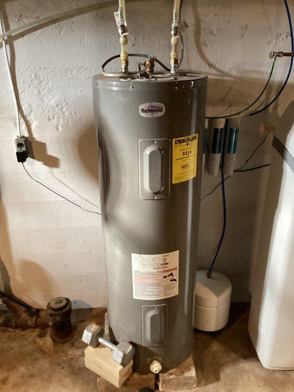 Performed comprehensive furnace tune-up on 5-year-old system per Family Rewards agreement. Conducted full operational inspection, cleaned flame sensor, verified proper condensate drainage, and inspected recently replaced air filter. Checked blower wheel cleanliness and tested all electrical components. During system operation test, adjusted second-stage gas pressure to achieve optimal 55° temperature rise, returning furnace to proper working specifications.