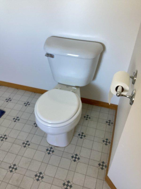 Responded to customer complaint of unusually high water bill. Upon inspection, identified a leaking toilet flush seal causing continuous water loss. Replaced toilet tank internal components (flush valve assembly and fill valve) to eliminate the leak and restore proper function.