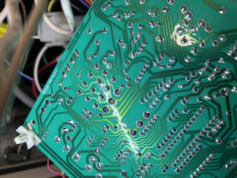 Responded to no-heat call for an 8-year-old furnace exhibiting pressure switch code failure. Diagnosed intermittent power loss to inducer motor despite call for heat at W terminal. Located faulty connection at control board and identified heat exchanger joint leak. Recommended control board replacement and blower wheel cleaning due to significant dirt accumulation affecting system performance.