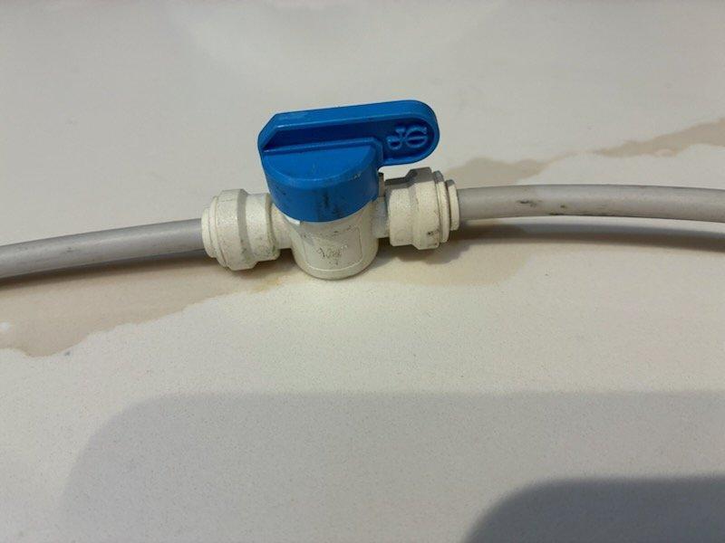 Responded to service call for restricted water flow to refrigerator. Diagnosed issue with existing fitting that was restricting water flow. Replaced defective fitting with appropriate connector to restore proper water supply to refrigerator.