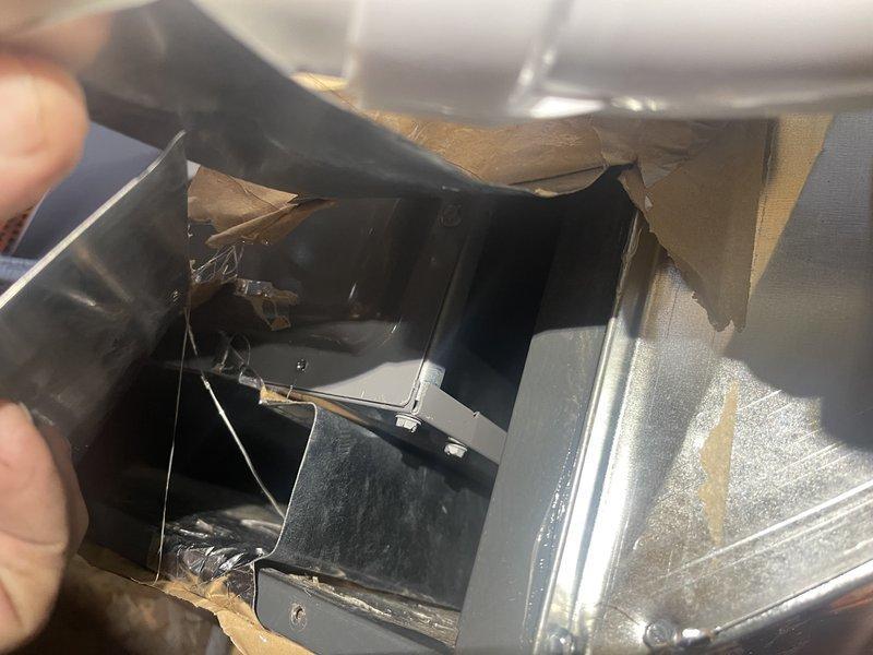 Inspected 4-year-old furnace failing to reach high-stage operation despite thermostat being set to 70°F with actual home temperature at 55°F. Determined root cause to be severe airflow restriction due to improper evaporator coil box installation, where the coil was placed inside a pre-existing box causing the SLP furnace to operate at only 70% capacity. Documented installation issue with photos for further consultation with management regarding remediation options.