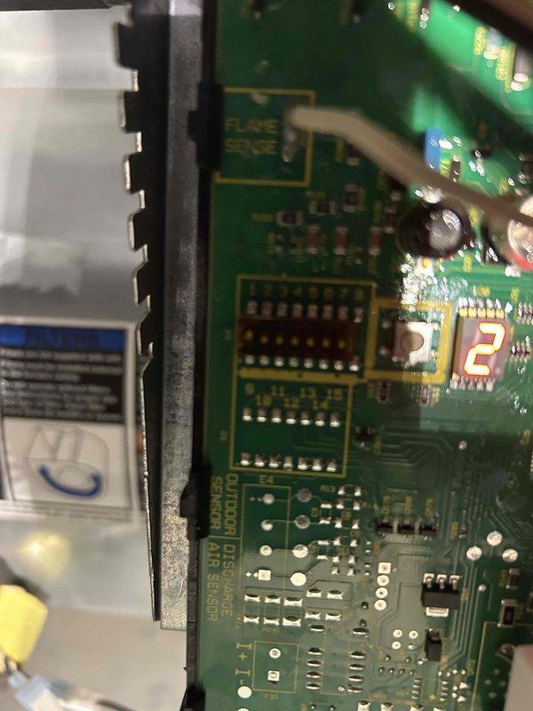 Diagnosed and resolved insufficient heating issue on 4-year-old furnace. Inspection revealed improperly configured control board with incorrect dip switch settings from previous installation. Properly configured dip switches to enable second-stage heating operation with single-stage thermostat, restoring normal furnace operation and heating capacity.