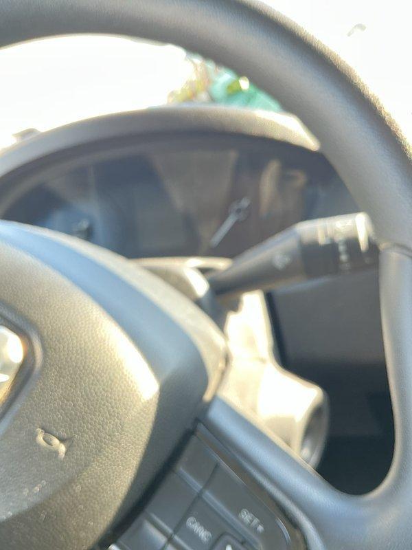 Responded to clogged drain service call at mobile home where washing machine was draining into master toilet/tub, with water leaking from toilet base. Diagnosed issue as likely frozen sewer line underneath house or plugged main. Advised customer that toilet reset would not resolve underlying drainage issue and recommended contacting specialized mobile home plumbing service with sewer main cleaning capabilities.