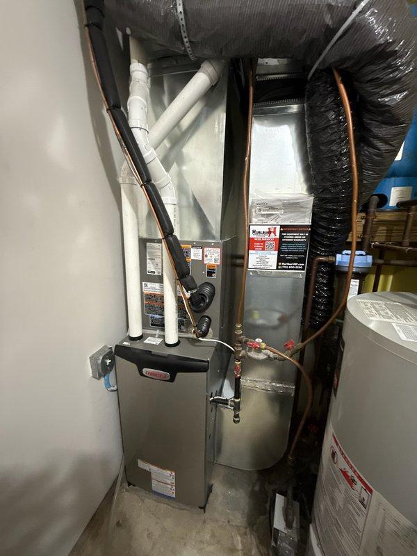 Responded to service call for newly installed Lennox natural gas furnace not producing heat. Upon arrival, system was operational. Identified intermittent pressure switch trips likely caused by improper drainage due to incorrect unit pitch. Adjusted furnace pitch to improve condensate drainage toward water outlet. System functioning normally at time of departure. Customer advised to monitor and report any recurrence of heating issues.