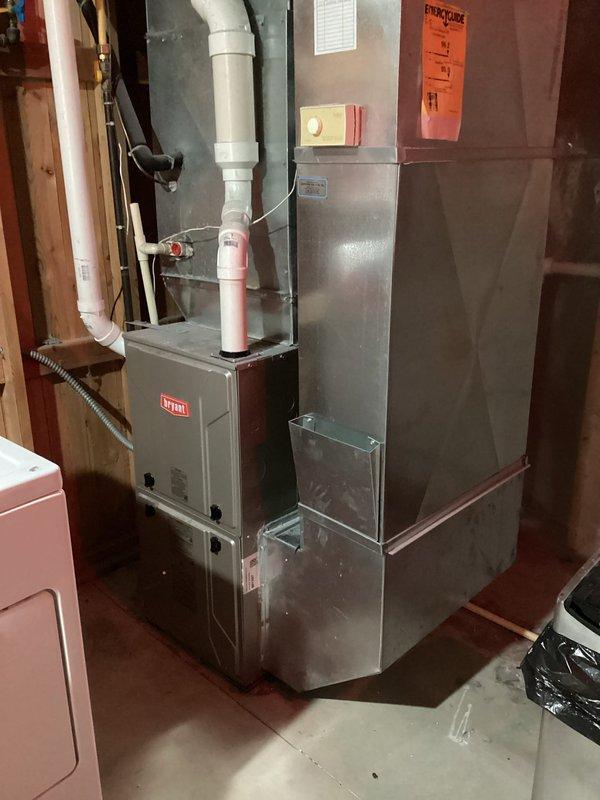 Responded to no heat call for a Bryant furnace of unknown age (10+ years). Diagnosed issue with condensate drain containing debris that was causing pressure switch interruption. Cleaned condensate drain line, restoring proper system operation. Inspected heat exchanger, flame sensor, and air filter - all in acceptable condition. Customer enrolled in maintenance plan after service completion.