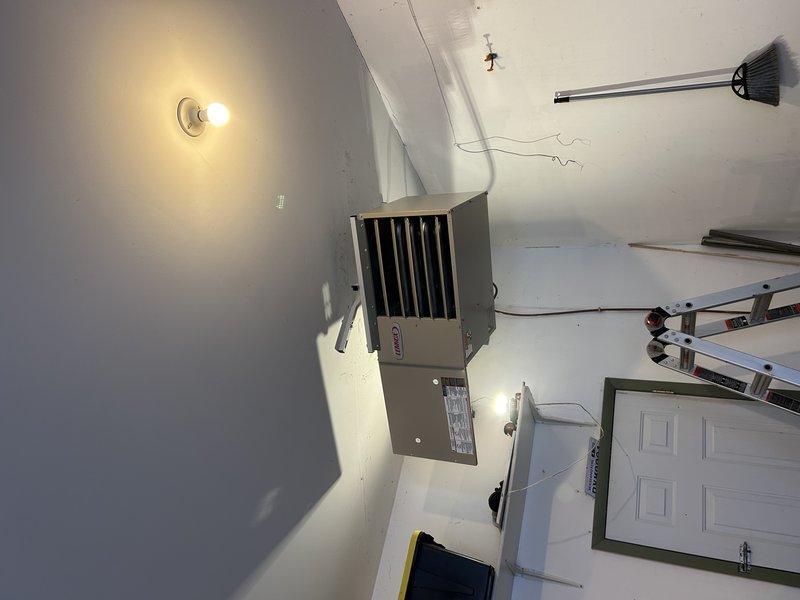 Successfully installed an LF25 Gas Unit Heater as a like-for-like replacement, reusing existing gas lines, electrical connections, and venting system while installing a new vent cap. Unit was mounted and tested properly, but installation remains incomplete due to missing thermostat plug-in component, which will require a follow-up service appointment.