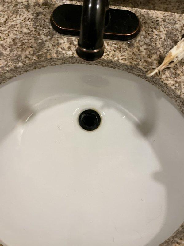 Responded to service call for an upstairs bathroom sink with severe clogging beyond customer's ability to resolve. Utilized drain snake machine to successfully clear the blockage in the drain line. Performed multiple drain tests by filling the sink basin completely to verify proper drainage had been restored and normal water flow was achieved.