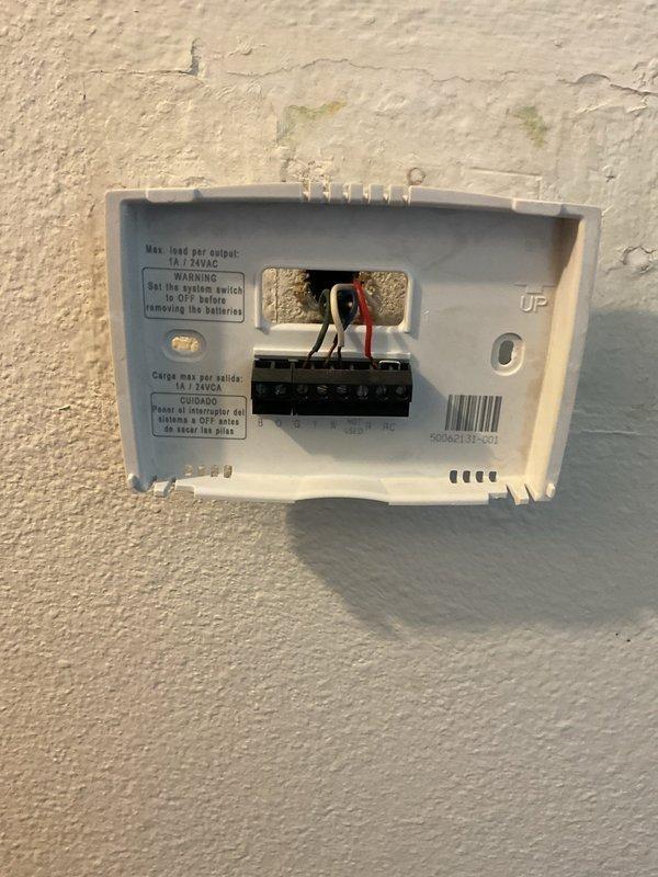 Assisted with thermostat installation by connecting wiring to the sub base and verified proper operation of fan, heating, and air conditioning functions. During furnace inspection, discovered the inducer motor was not properly secured to the collector box, tightened mounting hardware, which significantly improved unit operation and reduced noise levels. All systems tested and confirmed operational upon completion.