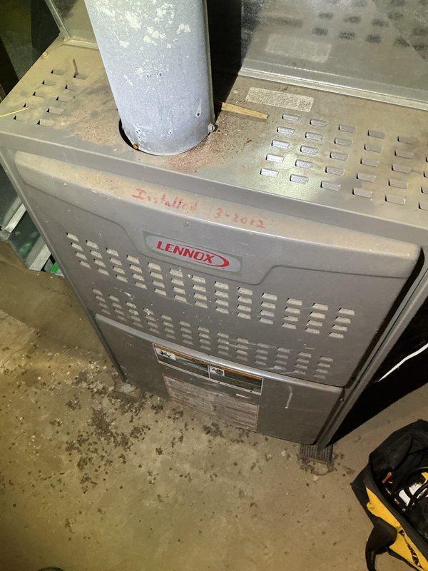 Responded to no heat complaint for a 16-year-old Lennox 80% efficiency furnace. Upon arrival, system was maintaining 63°F with intermittent heating issues. Performed comprehensive inspection including filter check, amp draw verification, pressure switch port cleaning, and ignition testing. System functioned properly during multiple test cycles, raising temperature to 68°F during service visit. Identified potential intermittent issue requiring further monitoring. Recommended comfort advisor consultation due to system age.
