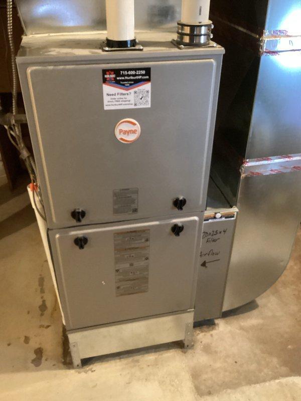 Conducted a plumbing inspection and identified a missing pipe causing seasonal leakage. Recommended replacement and capping of CPVC water line located above the furnace. Documented Payne HVAC system installation and bathroom fixtures, noting potential additional plumbing concerns throughout the property.