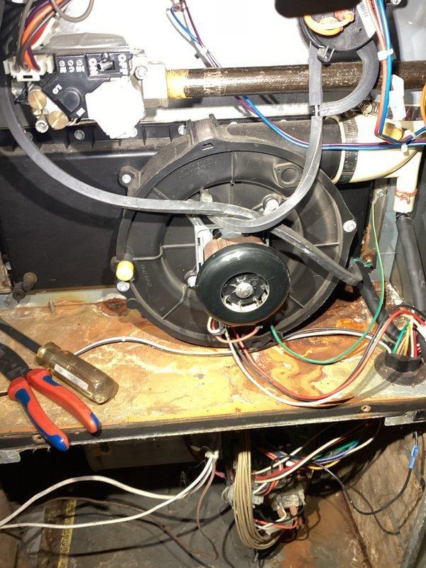 Responded to service call for intermittent furnace operation. Diagnosed system while operational, performed comprehensive inspection including heat exchanger, burners, flame sensor cleaning, and condensate system. Noted evidence of previous condensate leaks affecting furnace deck and possibly control board, though no active leaks present. Advised homeowner regarding age of equipment (20-year-old furnace) and recommended consultation with service advisor about replacement options.