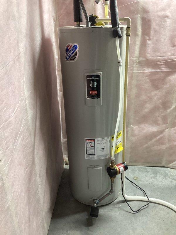 Performed furnace tune-up service on Lennox HVAC system, including cleaning of routine components and operational verification. Inspected adjacent water heater system for proper installation and function. Advised customer to continue using charcoal-backed filters as currently installed for optimal air quality and system performance.