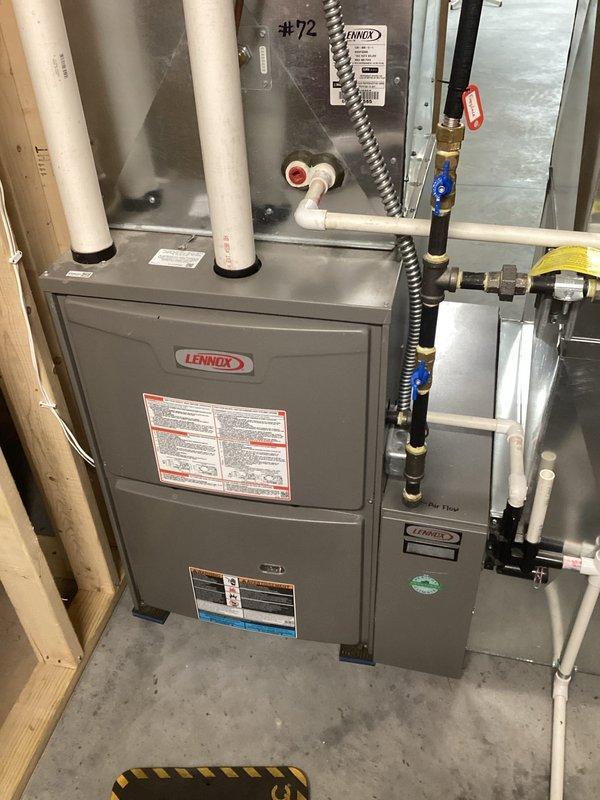 Performed furnace tune-up service on Lennox HVAC system, including cleaning of routine components and operational verification. Inspected adjacent water heater system for proper installation and function. Advised customer to continue using charcoal-backed filters as currently installed for optimal air quality and system performance.