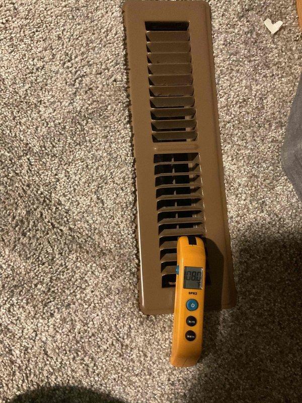 HVAC service inspection conducted in response to customer concern about uneven airflow following recent residing work. Testing revealed significant temperature differentials between rooms, with some vents discharging air at 90°F while others measured at 108°F as confirmed with digital temperature gauge. Unable to fully diagnose root cause due to finished basement and inaccessible ductwork; recommended further investigation to determine if issue related to siding installation or pre-existing condition.