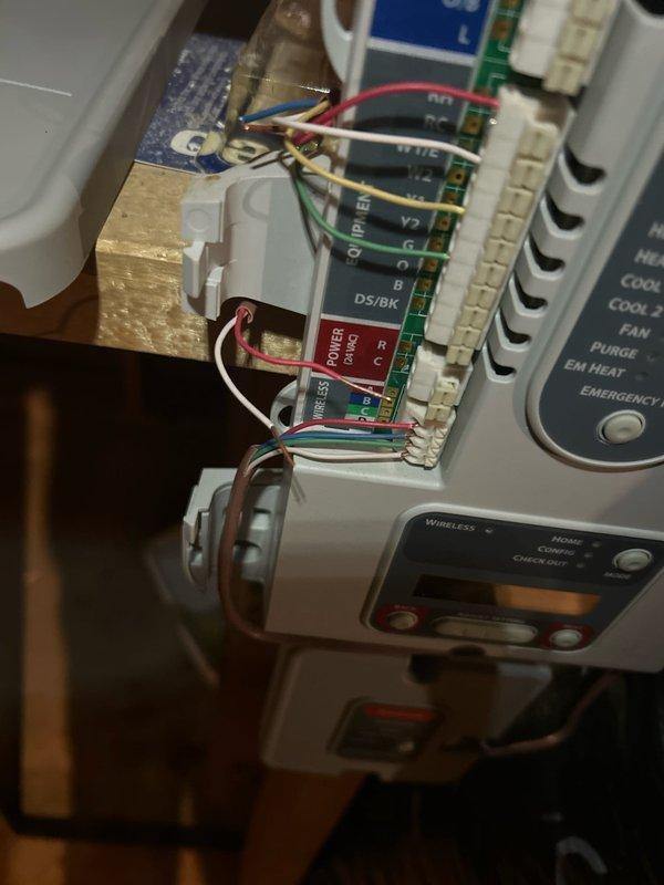 Responded to service call for non-functional furnace in a multi-zone Honeywell system. Diagnostic testing revealed system receiving 24V but not initiating heating cycle, likely due to moisture damage. No error codes present on furnace. Examined zone controller (HZ322) and internal wiring connections. Information forwarded to parts specialist for control board replacement estimate.