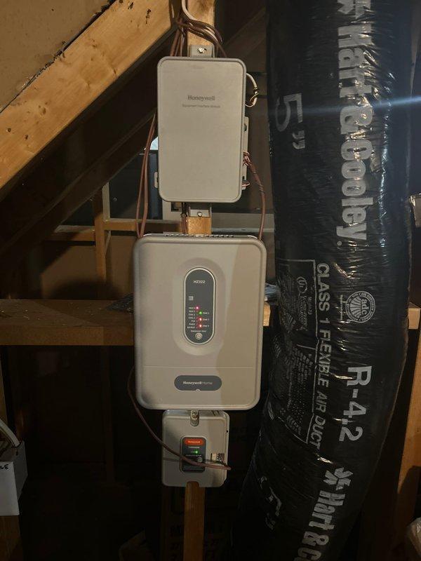 Replaced faulty HZ322 TRUEZONE PANEL with new control board per PO #197474-001. Installation completed successfully; however, encountered connectivity issues with third thermostat. Scheduled follow-up with electrician to resolve remaining zone connection problem and verify if thermostat requires updating.