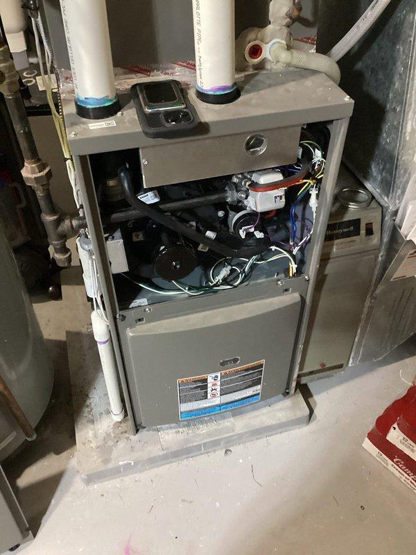 Diagnosed furnace pressure switch errors causing intermittent heating failure. Found pressure switch operating at critical threshold (1-1.3), close to limit. Corrected venting issues by adding higher vent on condensate trap per manufacturer specifications and installed 90° elbow at exhaust to improve orientation. System operational after service but noted pressure readings remain close to switch limit threshold.