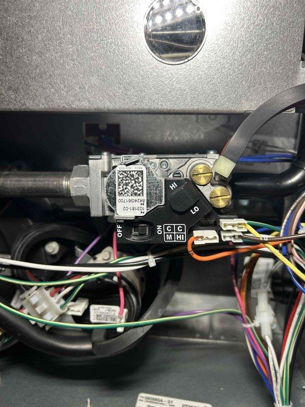 Performed comprehensive furnace tune-up on unit installed approximately one year ago. Inspection included heat exchanger integrity check, combustion analysis testing, gas pressure verification (high/low stage), examination of flame sensor and burners, and blower motor assessment. All components functioning properly with no immediate concerns noted; air filter in moderate condition, pressure switch cleaned, and thermostat operation verified.