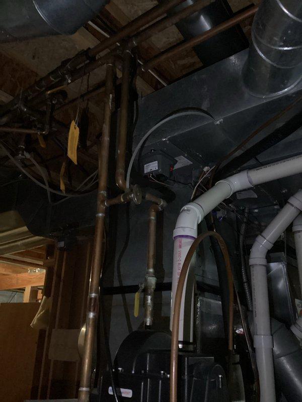 Resolved multi-zone heating issue in aging HVAC system by replacing a third damper to complement previous repairs. System had experienced cascading failures including water damage to motherboard and two faulty dampers, all of which were previously addressed. Final diagnostic testing confirmed all zones are now functioning properly with adequate heat distribution throughout the property.
