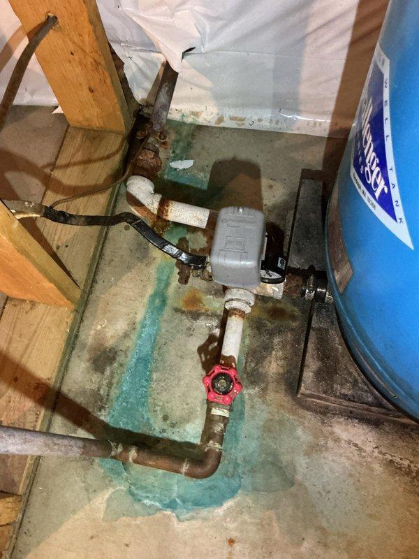 Inspected three Kohler toilets in customer's residence. Identified one toilet requiring replacement of flapper, fill valve, and supply line. Provided estimate for complete repair work including installation of new tank inserts for all three units. Additionally, assisted customer with kitchen drawer removal to enable access to under-sink plumbing. Documented existing water heater installation and noted significant corrosion on utility room piping system with evidence of water damage on concrete floor beneath.