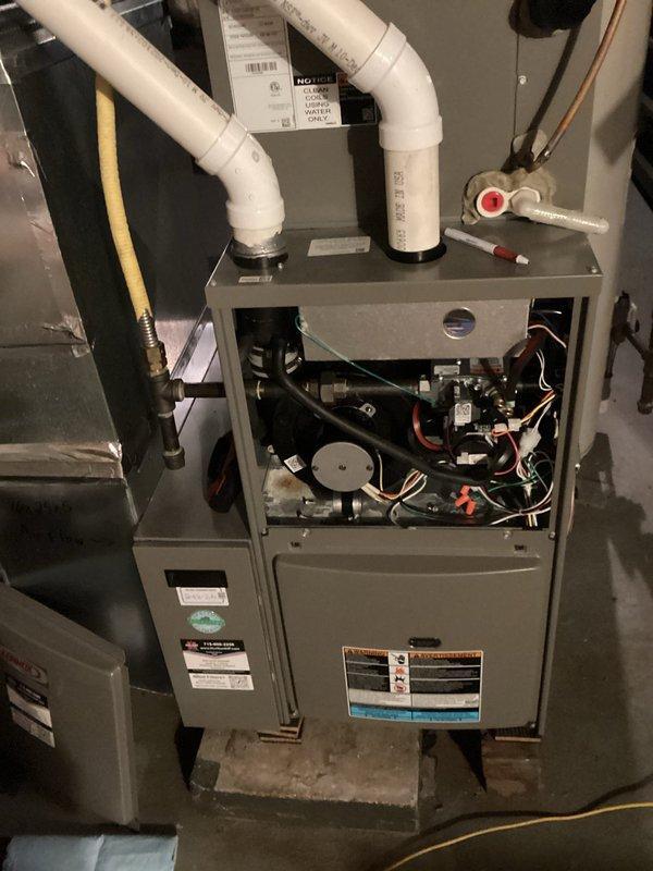 Performed annual furnace maintenance including comprehensive inspection of heat exchanger, burners, and flame sensor. Cleaned condensate line and flame sensor to ensure optimal performance. Examined blower motor and verified proper system operation. Furnace is in excellent condition with no issues detected.