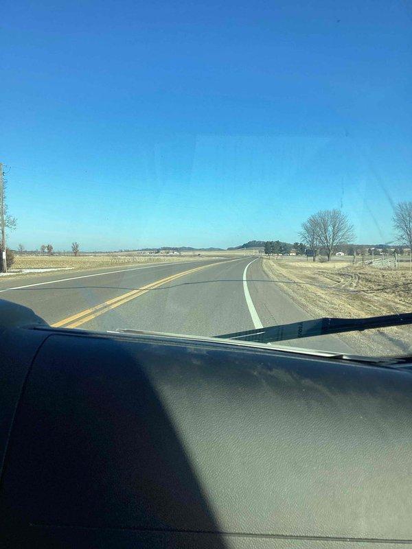 Responded to service call for Lochinvar boiler that was not producing hot water. Diagnosed issue as flame sense failure causing boiler to light and drop out; additionally discovered cracked pressure switch hose. Replaced pressure switch hose to restore temporary operation and recommended replacement ignitor, which has been ordered.