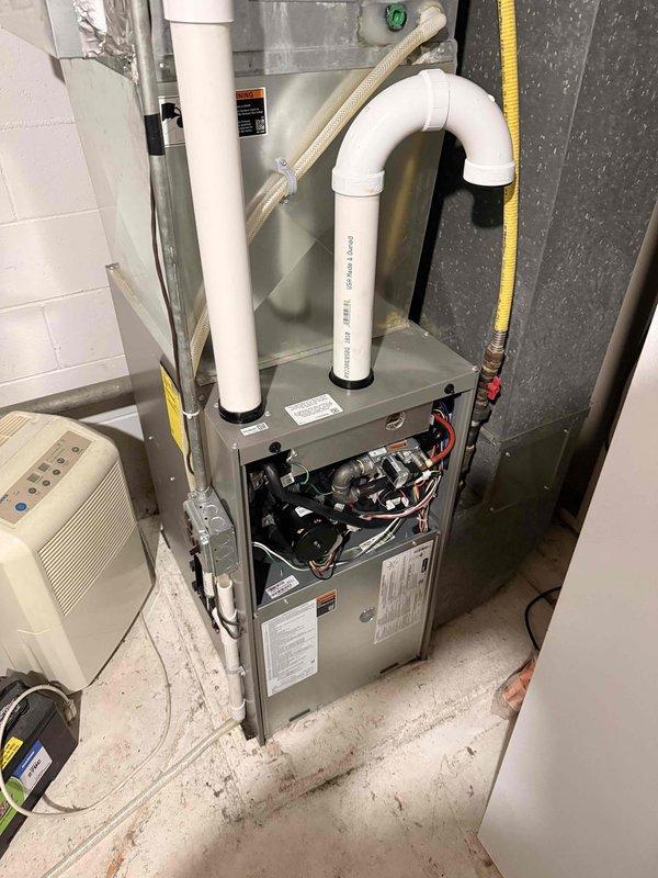 Performed diagnostic assessment on furnace that was failing to maintain set temperature (63°F vs 68°F setpoint). Conducted comprehensive preventative maintenance inspection. Identified minor buildup on flame sensor but unit was otherwise clean and functioning within manufacturer specifications. Cleaned components and monitored system operation for 20 minutes to verify proper heating performance. No further issues detected; system now operating correctly and maintaining desired temperature.