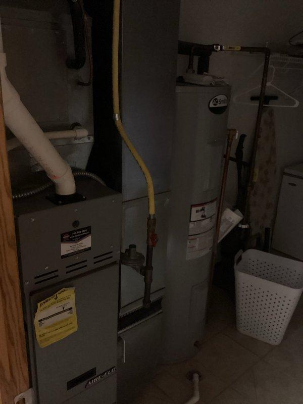 Successfully replaced defective draft combustion inducer assembly on water heater system, installing new booster assembly to restore proper ventilation as evidenced by normal exhaust operation. System was thoroughly tested following installation to confirm proper functionality and safe operation.