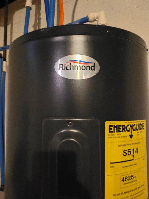 Responded to service call for insufficient hot water issue with a 13-year-old Richmond 50-gallon electric water heater. Diagnostic testing revealed failed heating elements. Removed existing unit and installed new Bradford White 50-gallon electric water heater, completing all necessary connections and testing for proper operation.