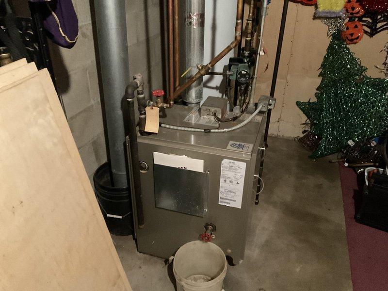 Diagnosed low water pressure issue caused by a leaking sediment filter that needed replacement. Installed new pressure gauge on water line to monitor system performance. Recommended installation of a new Rusco Sediment Filter to address ongoing filtration problems and prevent future leakage.