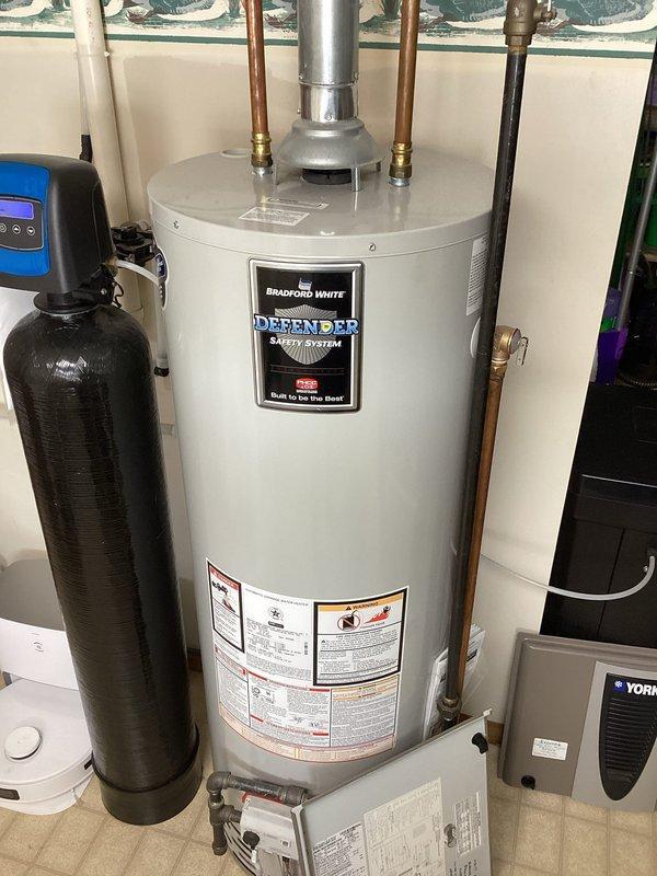 Diagnosed York LP furnace with intermittent operation where unit would attempt to fire but shut down shortly after flame ignition. Inspection revealed heavily corroded flame sensor with significant build-up, which was thoroughly cleaned. Performed comprehensive system check including verification of condensate trap drainage and heat exchanger inspection with no additional issues found. Upon reassembly and testing, furnace now operates normally with proper flame retention.