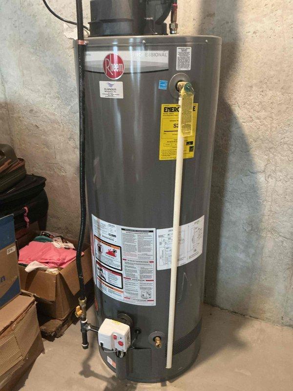 Responded to ongoing humidity complaint causing floorboard separation issues. Inspected Aprilaire humidifier system which was functioning properly; slightly adjusted settings upward to increase humidity output. Advised customer to expect gradual improvement by spring. Also documented Rheem water heater installation as part of home's overall humidity management system.