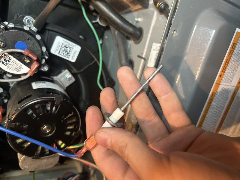 Diagnosed LP furnace with flame sensor issue indicated by 7 red blinking lights. Inspection revealed significantly plugged burners affecting consistent ignition across all ports. Replaced burners, cleaned flame sensor, and verified proper operation with good temperature readings.