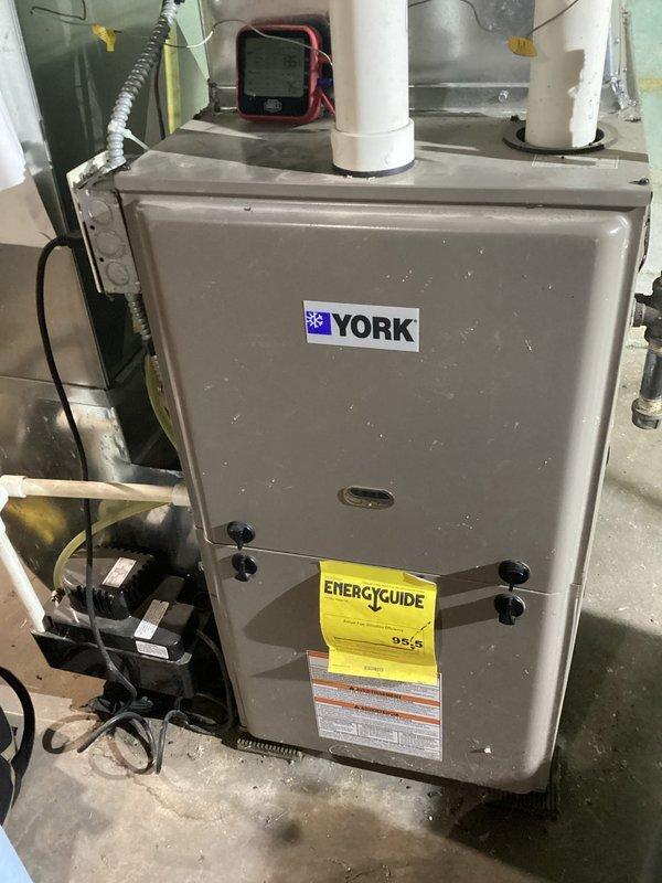 Responded to no heat complaint on 11-year-old York furnace experiencing intermittent heating with cold air blowing and brief warm air cycles lasting 1-2 minutes at startup. Performed comprehensive system diagnostics while unit operated normally for approximately 30 minutes. Conducted control board recall diagnostic which revealed limit switch error code. Inspected electrical components, wiring connections, and safety controls. Customer approved estimate for limit switch replacement and parts order was processed for installation.