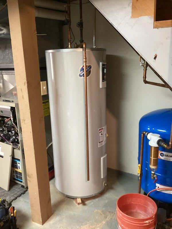 Completed annual furnace tune-up on 20-year-old unit, including cleaning flame sensor and verifying proper condensate drainage. Diagnosed and resolved humming noise caused by overly restrictive MERV 14 air filter; replaced with MERV 8 filter to restore proper airflow and eliminate noise. Inspected heat exchanger with no concerns found. Addressed non-functioning humidifier by correcting improper wiring from G terminal to proper heat-activated circuit, replaced humidifier pad, and verified operation. All systems tested and operating properly upon completion.