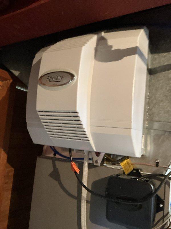 Completed comprehensive furnace tune-up and maintenance on single-stage gas heating system. Performed full system inspection including heat exchanger examination for wear and damage, combustion analysis testing, gas pressure verification, flame sensor and burner inspection, and blower motor/wheel assessment. Replaced 20x25x5 MERV 16 air filter and humidifier pad due to white powder buildup concerns. Cleaned and cleared pressure switch, verified thermostat operation and heating functionality. All components operating within normal parameters with no immediate repairs required.