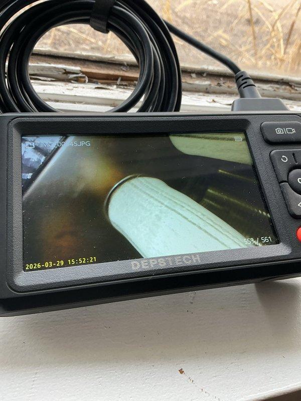 Responded to a recently purchased auction property for scheduled furnace and AC maintenance tune-up on a 5-year-old HVAC system. Upon arrival, discovered utilities including power and gas had not been restored as expected, preventing completion of full system inspection and tune-up procedures. Initiated partial inspection of accessible components and utilized inspection camera equipment to examine ductwork and ventilation system interior conditions. Documented equipment make, model, and serial number information with photographs for service records. Due to lack of power preventing proper system operation and safety testing, rescheduled service appointment to complete remaining maintenance procedures once utilities are restored.