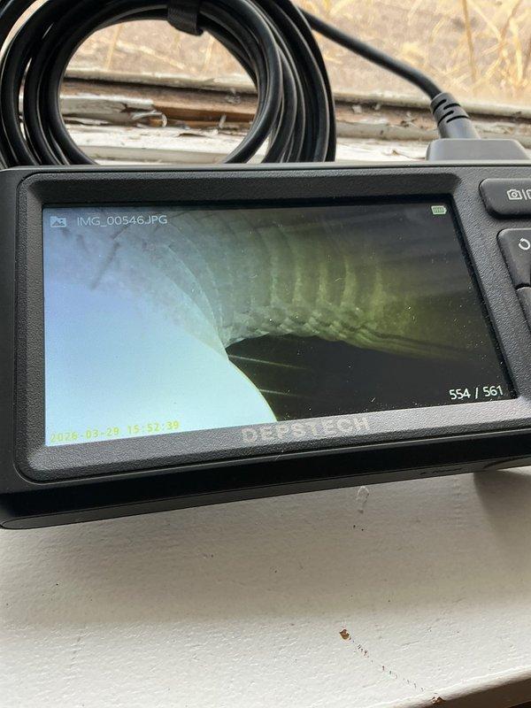 Responded to a recently purchased auction property for scheduled furnace and AC maintenance tune-up on a 5-year-old HVAC system. Upon arrival, discovered utilities including power and gas had not been restored as expected, preventing completion of full system inspection and tune-up procedures. Initiated partial inspection of accessible components and utilized inspection camera equipment to examine ductwork and ventilation system interior conditions. Documented equipment make, model, and serial number information with photographs for service records. Due to lack of power preventing proper system operation and safety testing, rescheduled service appointment to complete remaining maintenance procedures once utilities are restored.