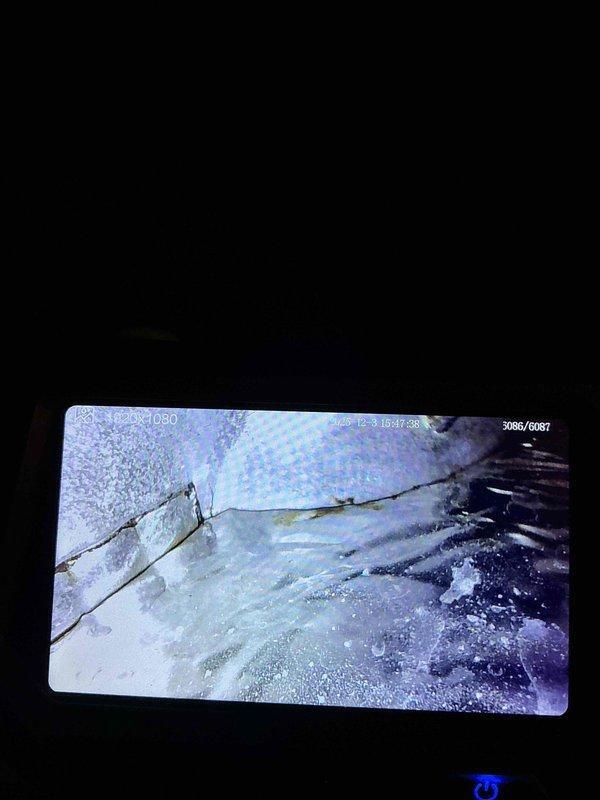 Cottage Grove, MN - Diagnosed 25-year-old Trane gas furnace with no heat and burning odor. Found seized blower motor and identified multiple cracks in the heat exchanger via inspection camera. Although cracks were not severe enough to require immediate system shutdown, advised customer of potential carbon monoxide hazard and scheduled follow-up consultation to discuss replacement options.